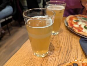 some beers in a fancyish pizza restaurant